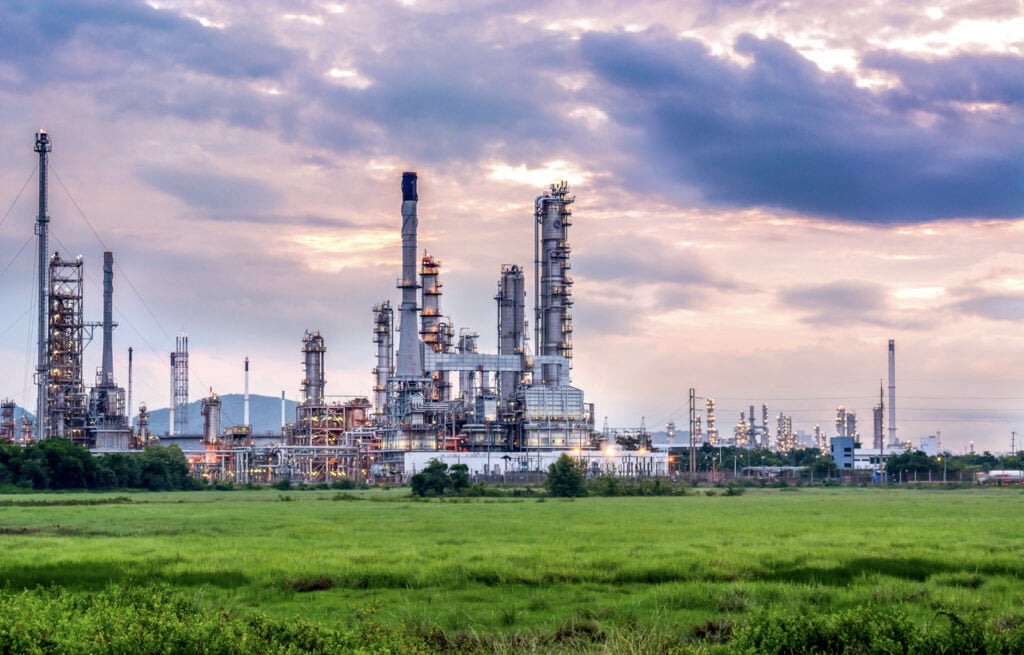 Oil and gas industry - refinery at sunset - factory - petrochemical plant